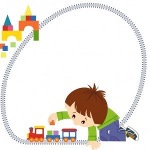 Happy boy playing toy train